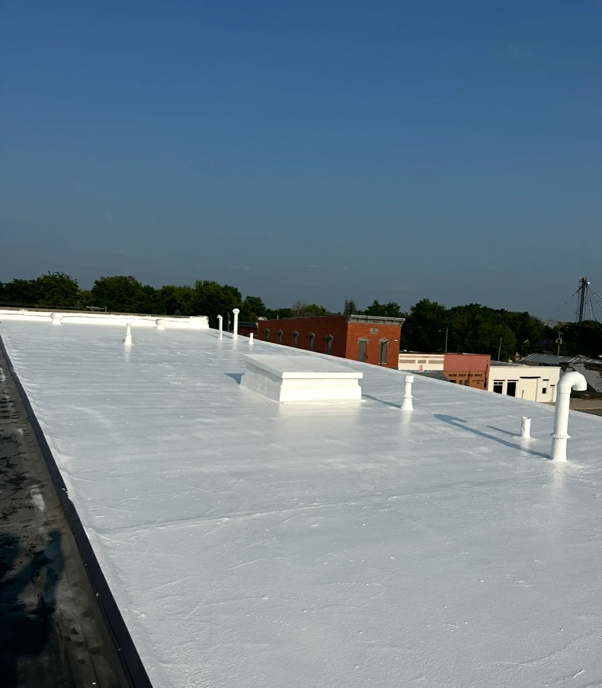 Commercial roof coating system