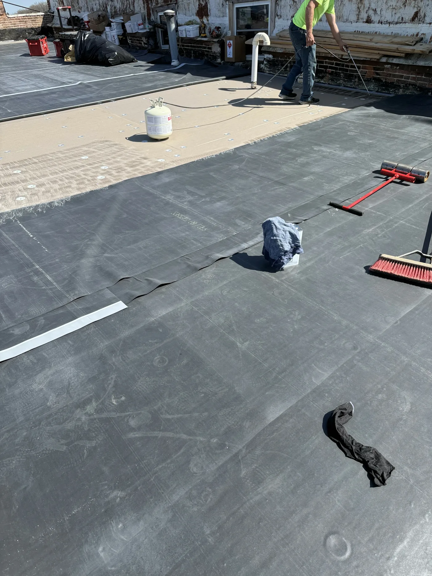 Installing EPDM membrane on commercial roof