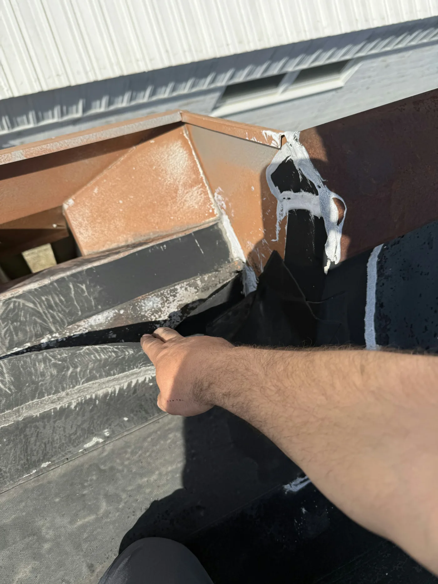 Old membrane failure on commercial roof