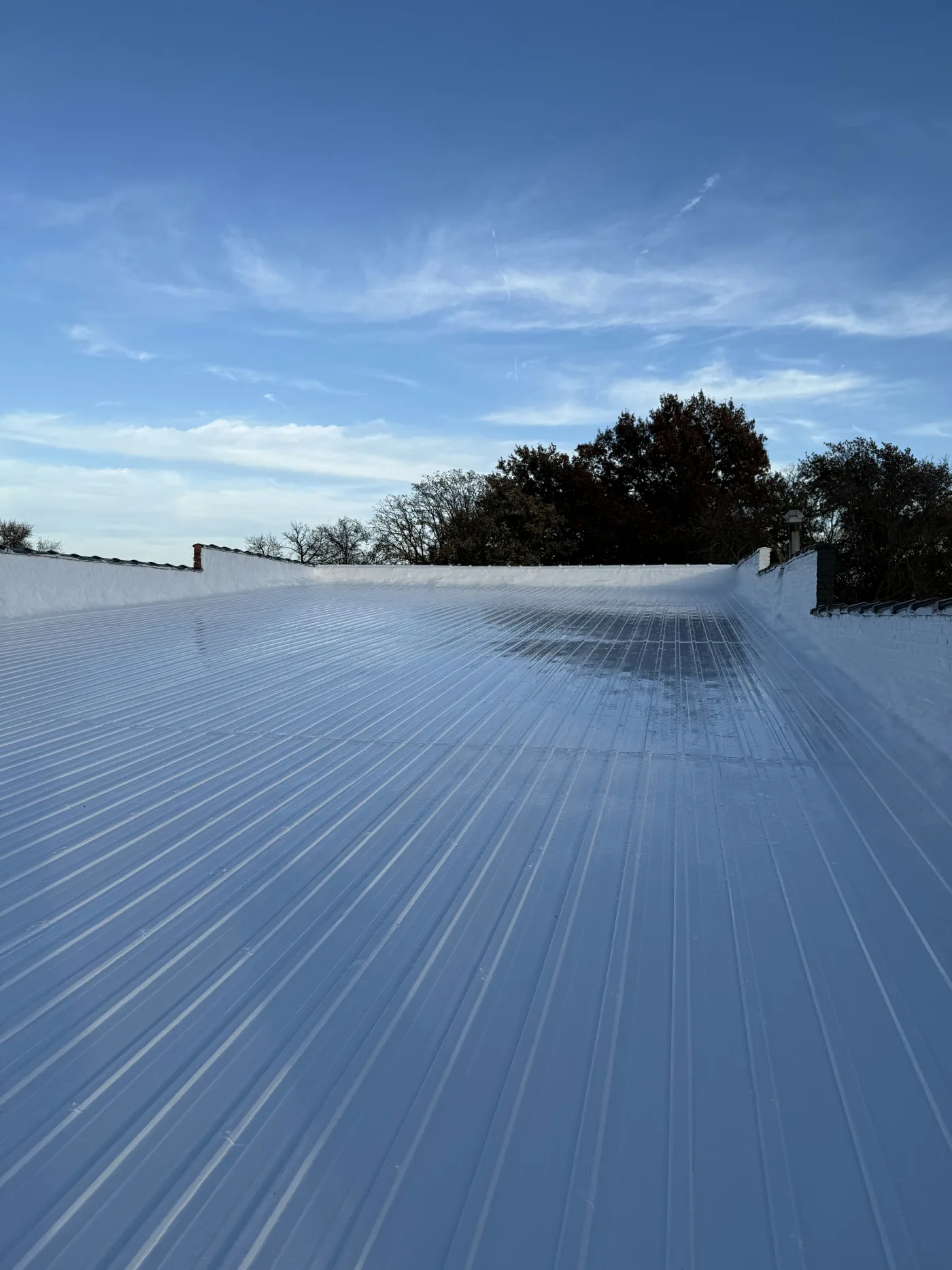 Silicone roof coating application